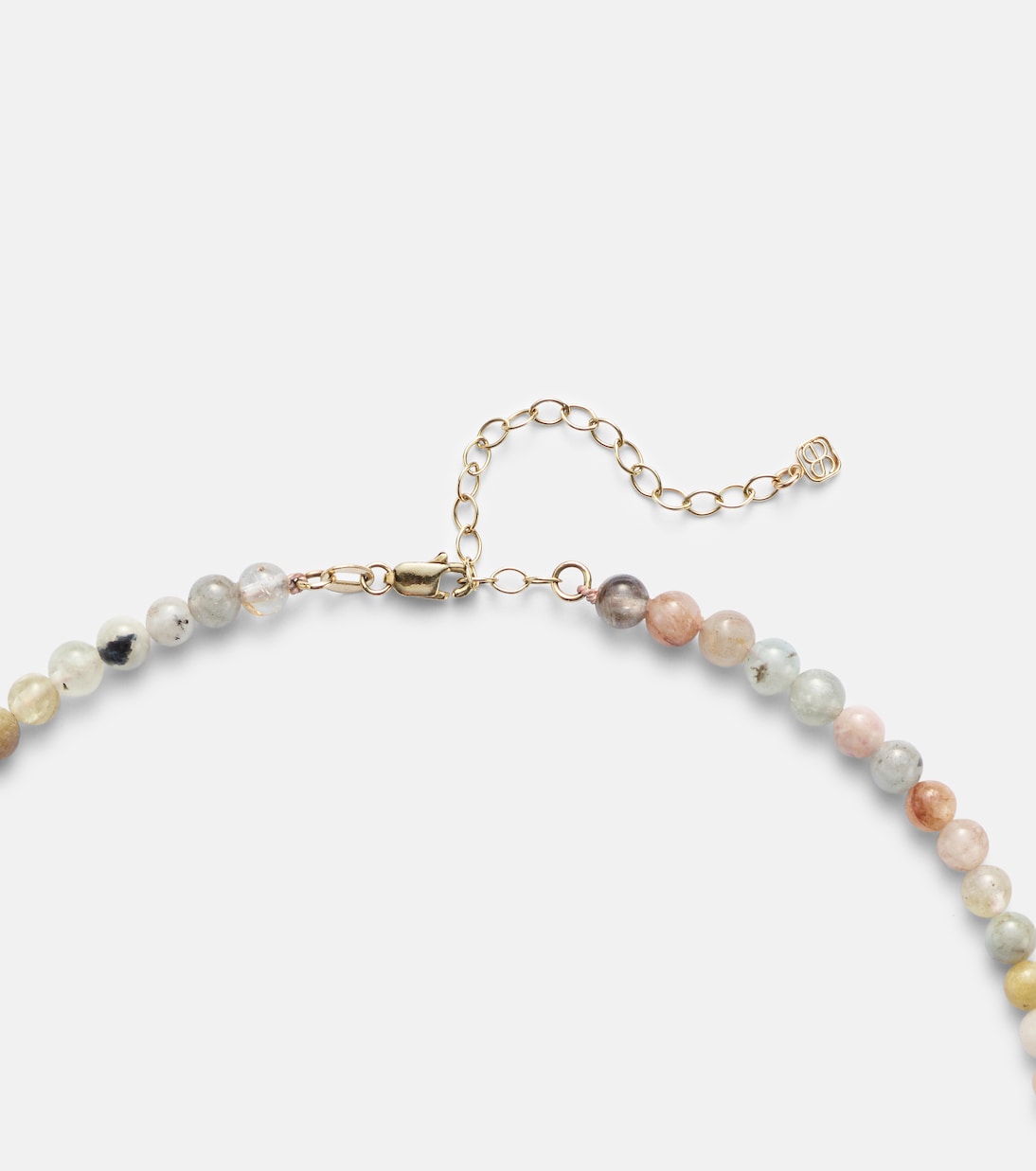 Collana in oro giallo 14kt con dettagli in diamanti e morganite, design elegante a conchiglia, perfetta per un look giovane e raffinato.