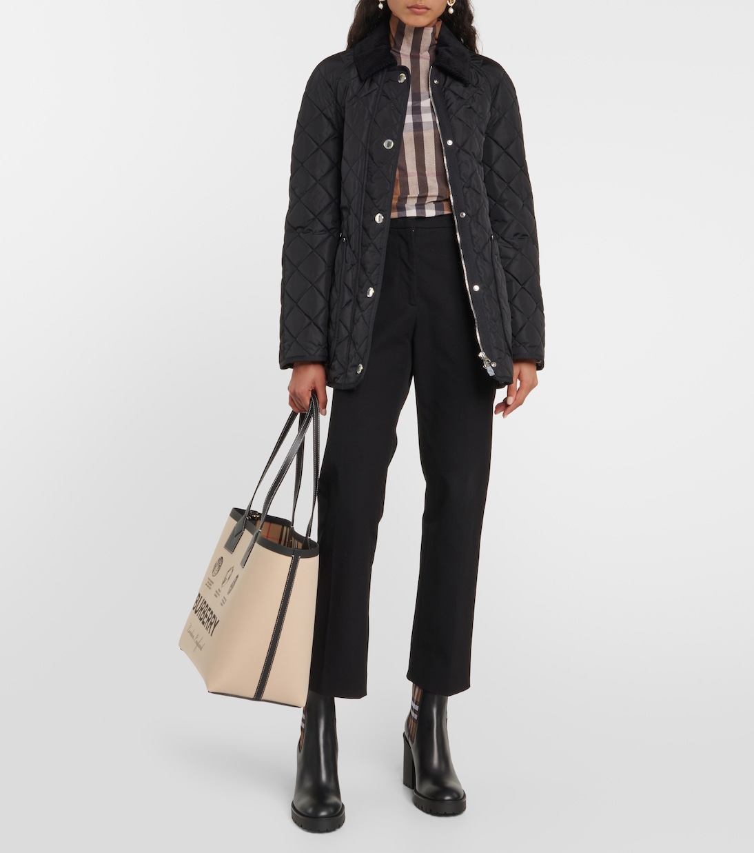Quilted belted jacket in black Burberry Mytheresa