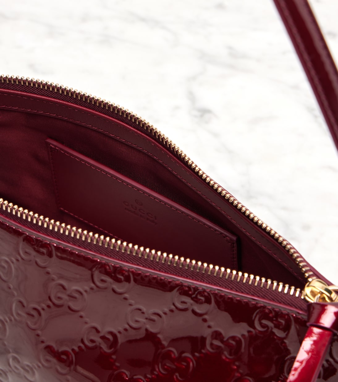 GG Emblem Small leather shoulder bag | Gucci