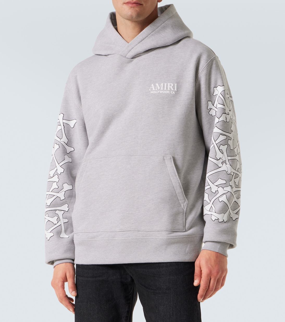 Bones Stacked logo cotton jersey hoodie in grey - Amiri