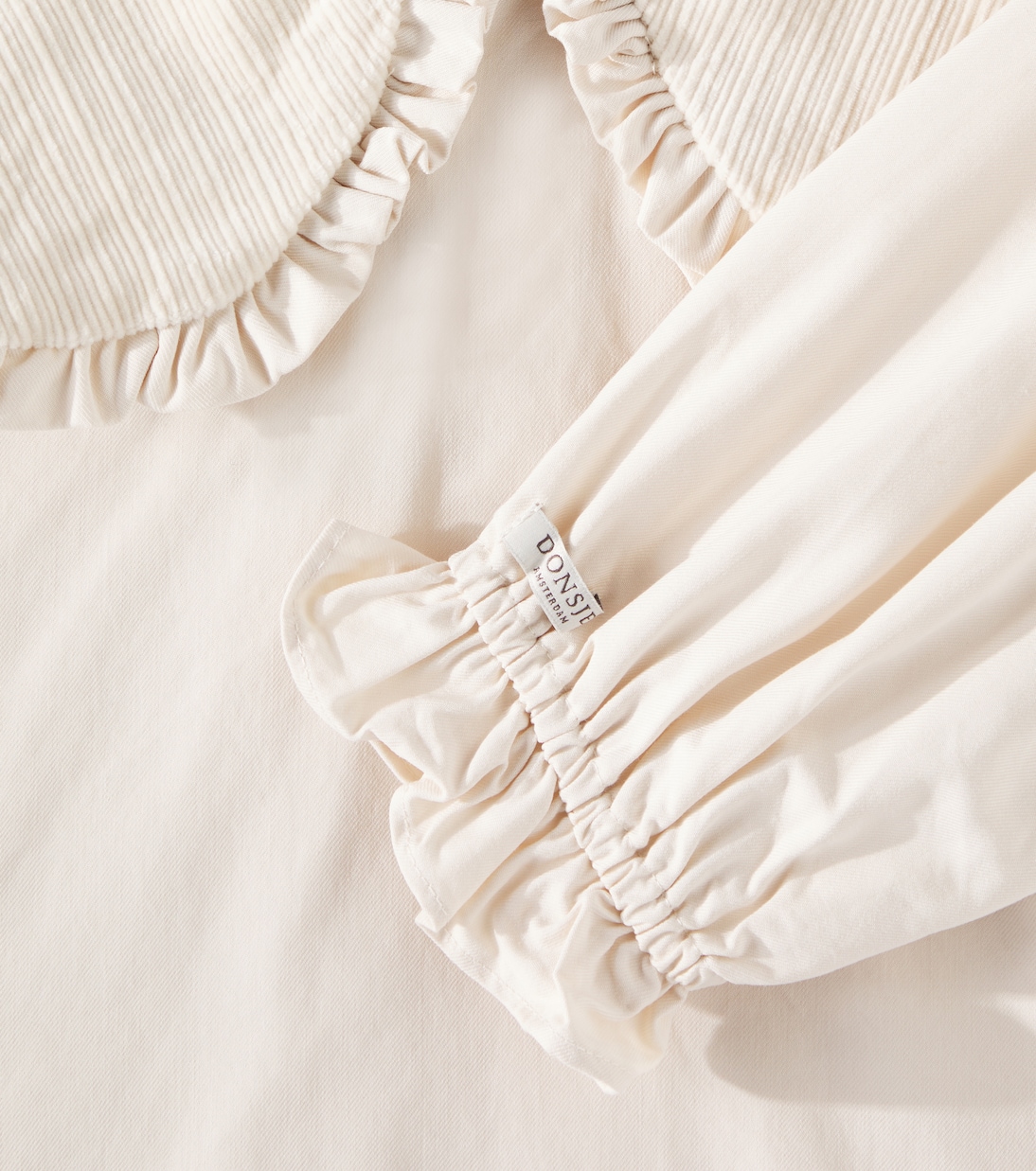 Mellys ruffled cotton-blend blouse | Donsje