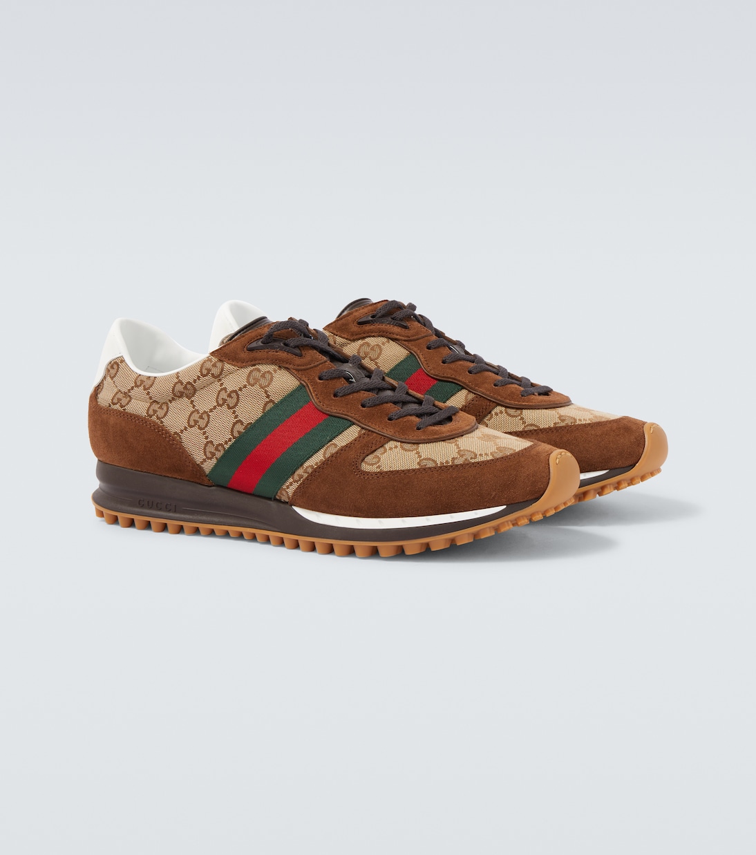 حذاء سنيكرز مقلّم بالجلد السويدي Re-Motion GG Canvas | Gucci