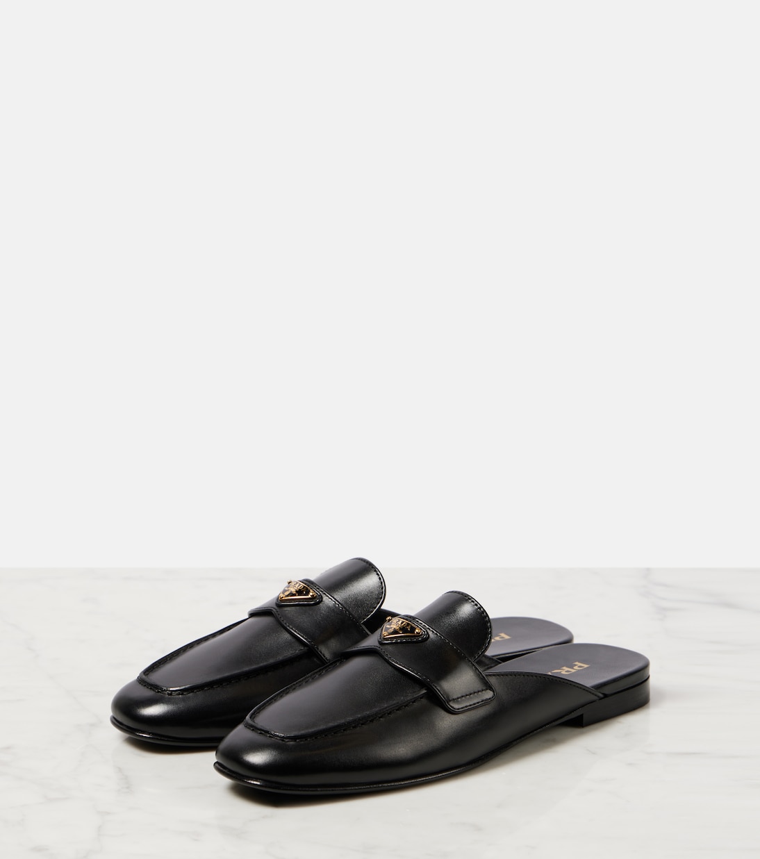 Mules in pelle | Prada