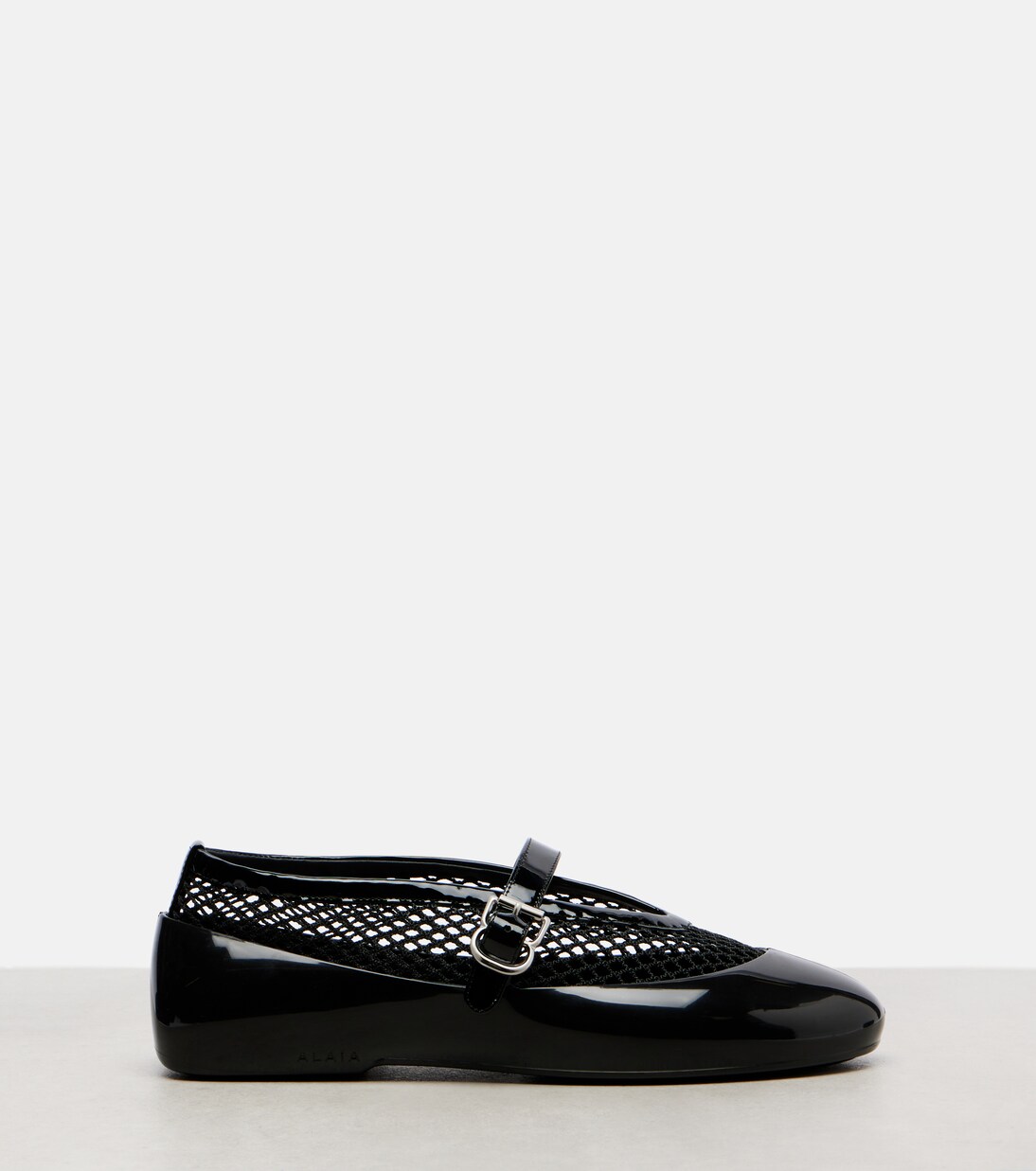 Leather-trimmed fishnet ballet flats | Alaïa