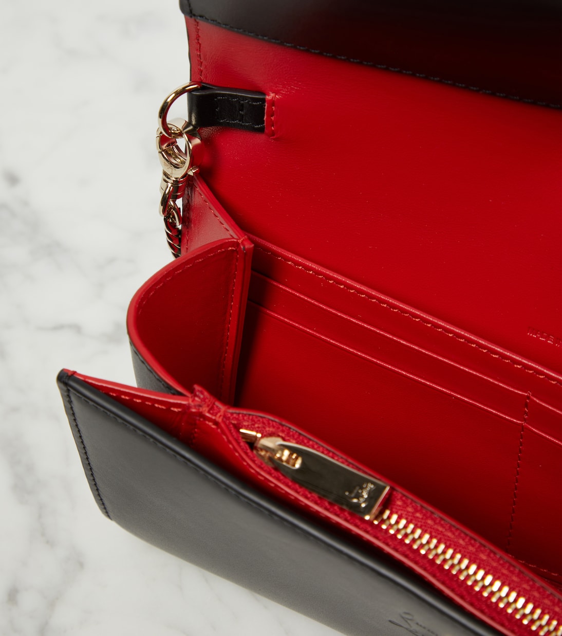 Portafoglio in pelle con catena firmato Christian Louboutin - Stile giovane e trendy