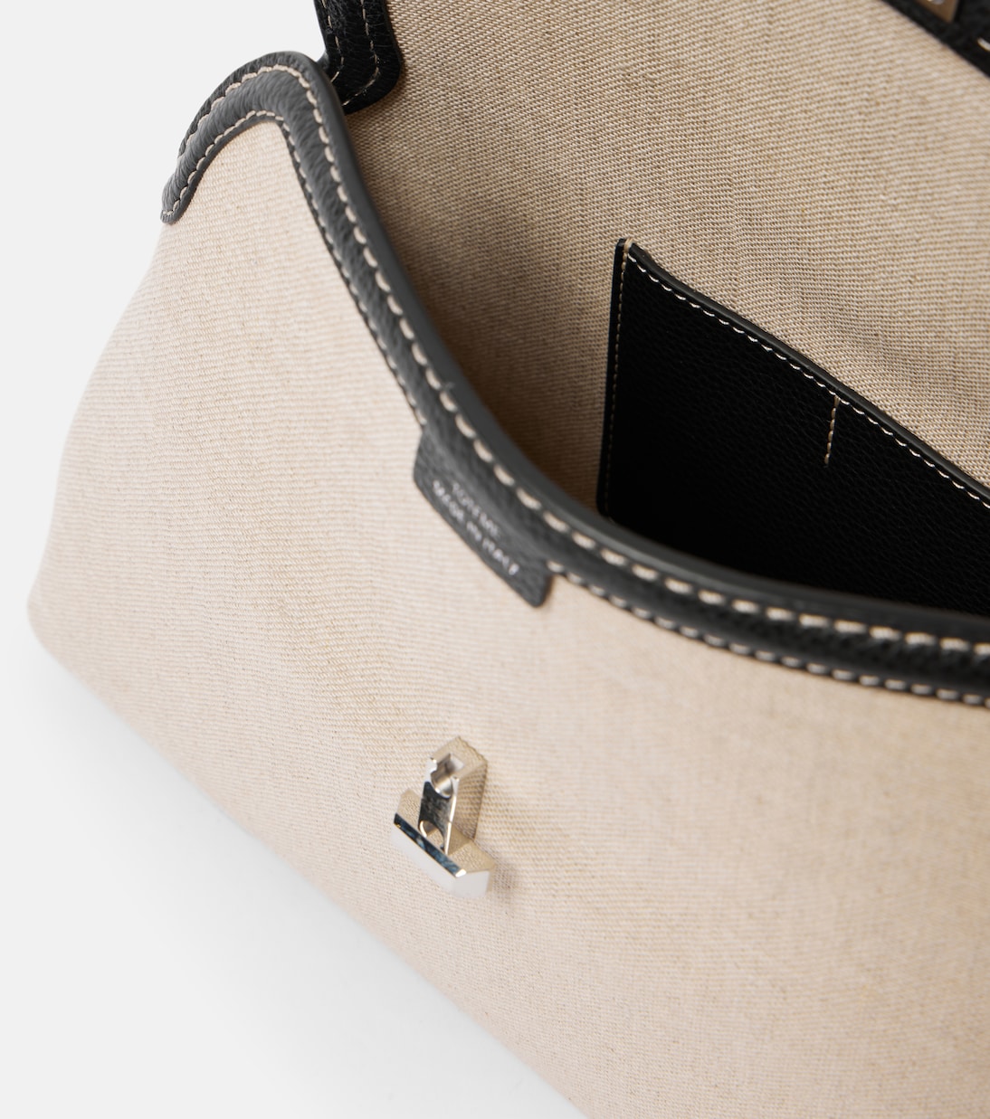 Clutch T-Lock in canvas con pelle | Toteme