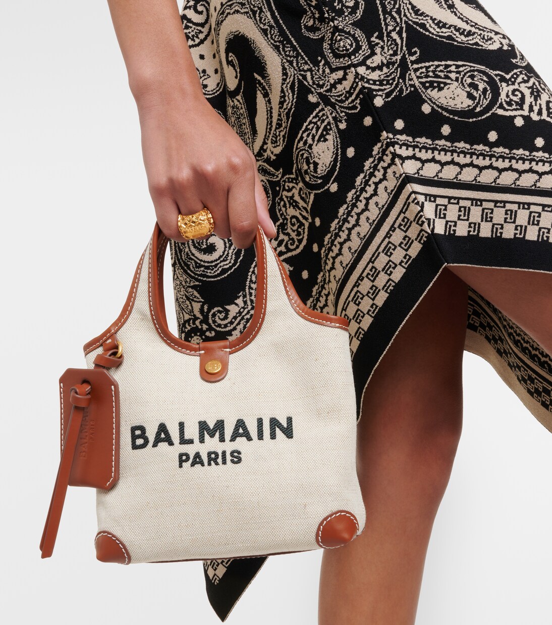 Small leather trimmed canvas tote bag in beige Balmain Mytheresa