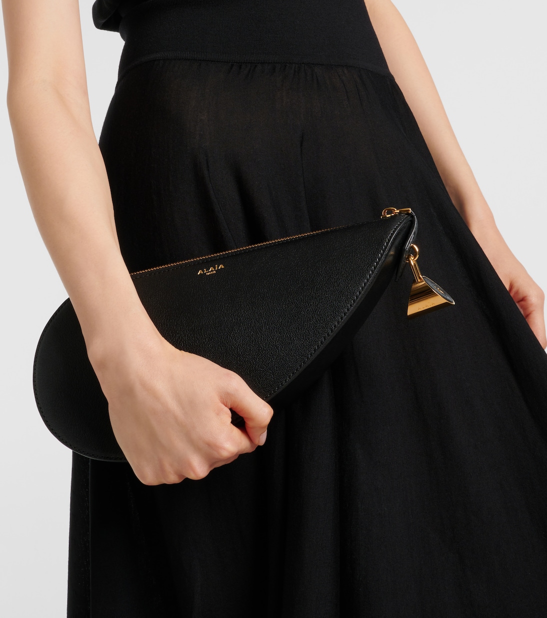 Clutch Le Demi Cœur aus Leder | Alaïa