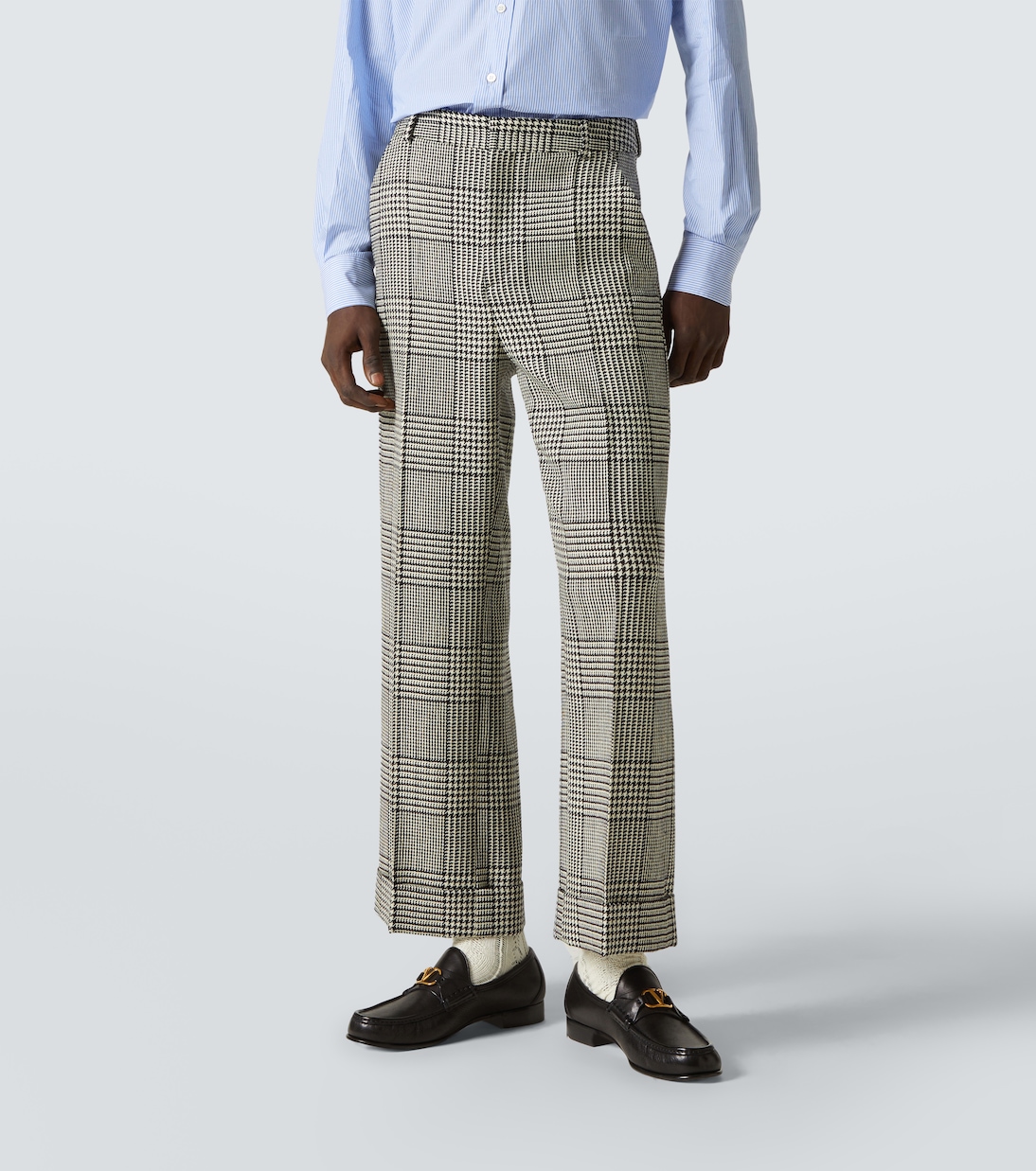 Houndstooth virgin wool flared pants | Valentino