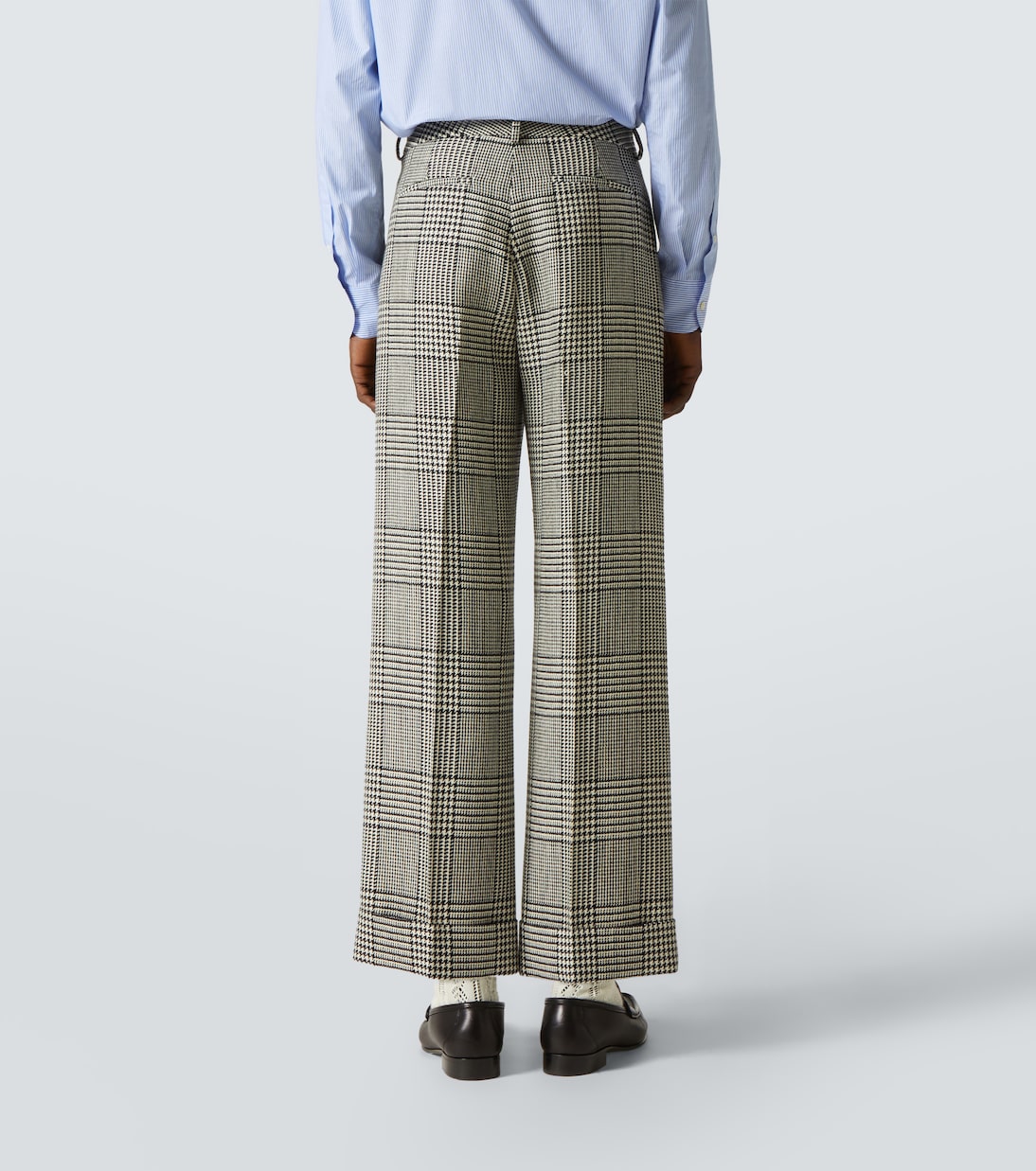 Houndstooth virgin wool flared pants | Valentino