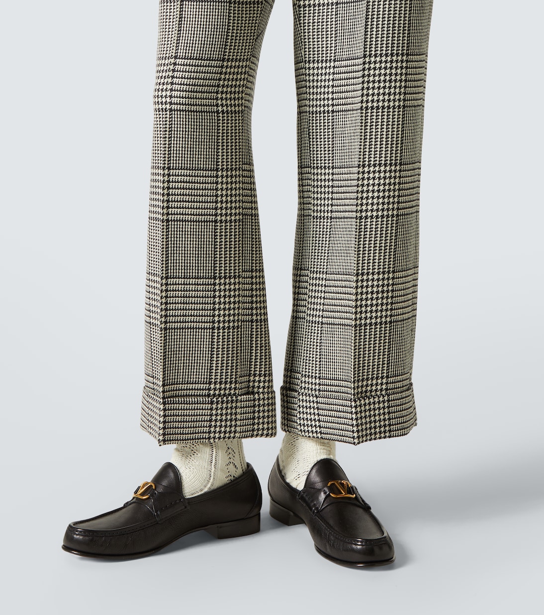 Houndstooth virgin wool flared pants | Valentino