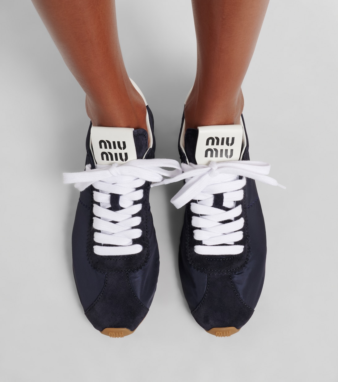 Plume suede-trimmed sneakers | Miu Miu