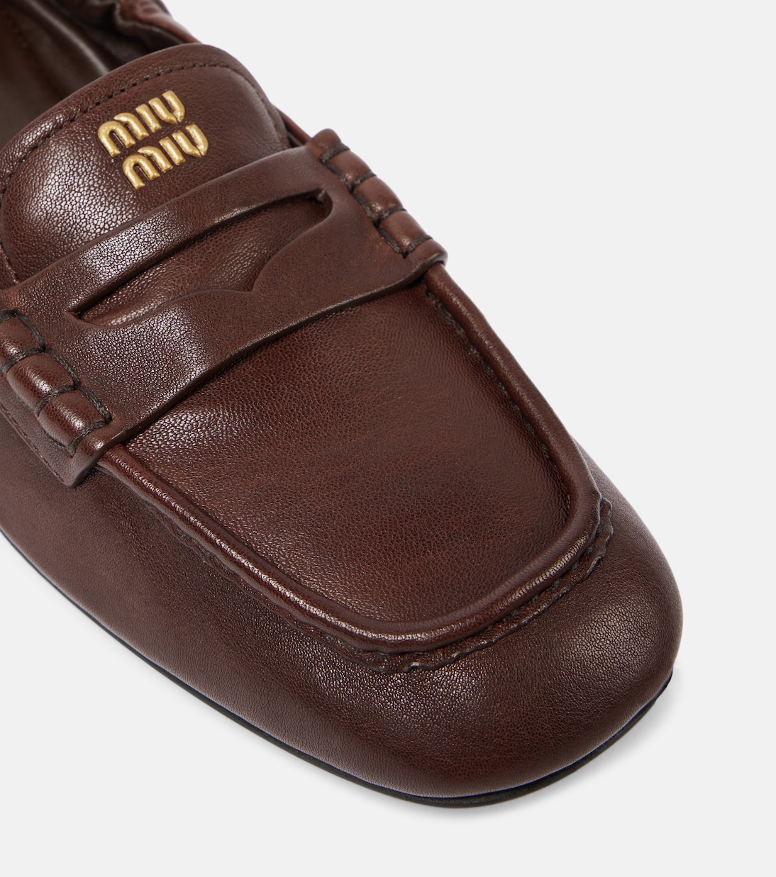 Logo leather penny loafers | Miu Miu