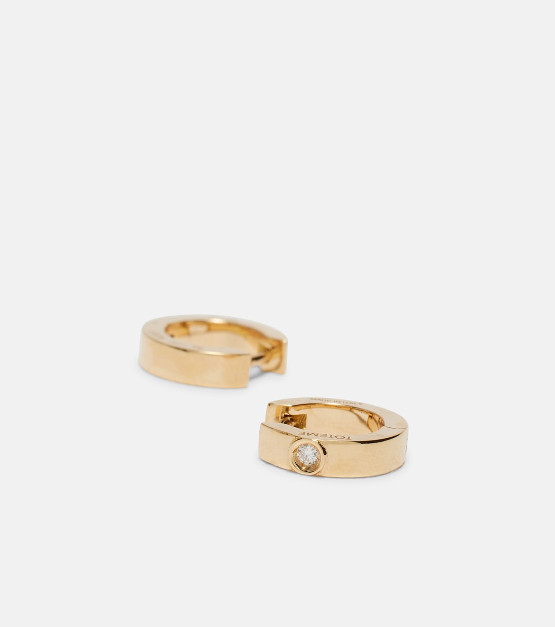 Orecchini in oro 18kt con diamante | Toteme