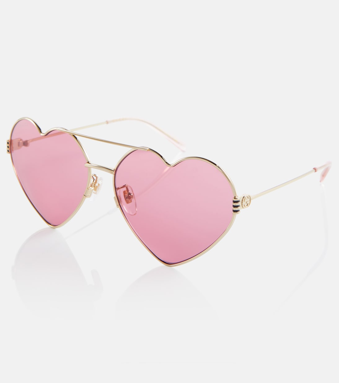 Occhiali da sole GUCCI con dettagli a cuore, stile giovane e trendy