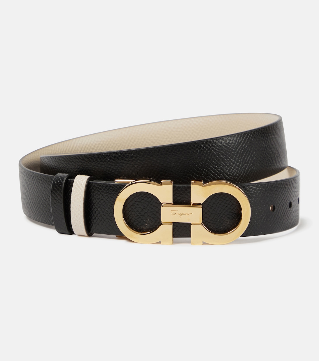 Cintura in pelle reversibile FERRAGAMO con logo Gancini, stile giovane e moderno