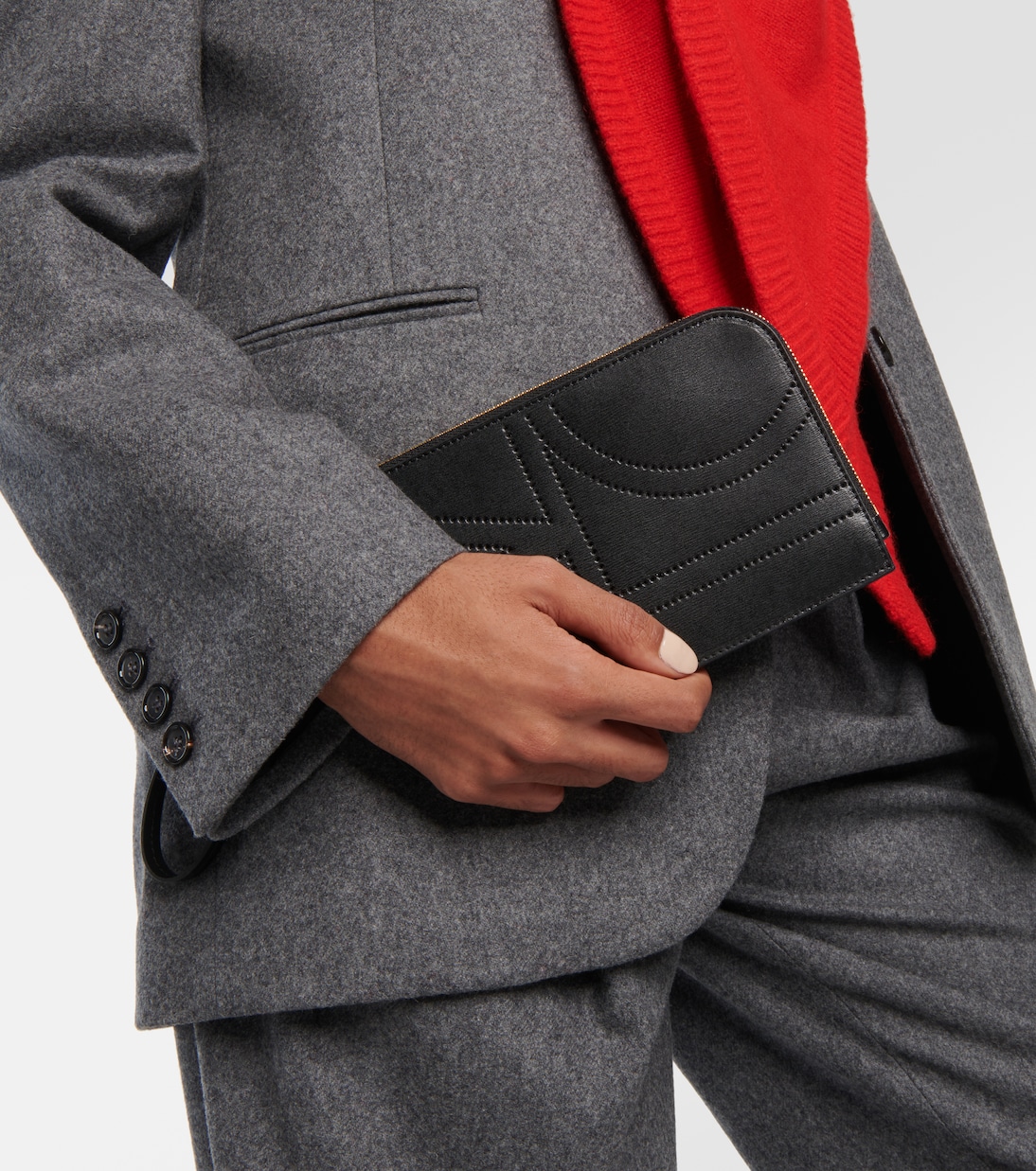 Pochette in pelle con monogramma | Toteme