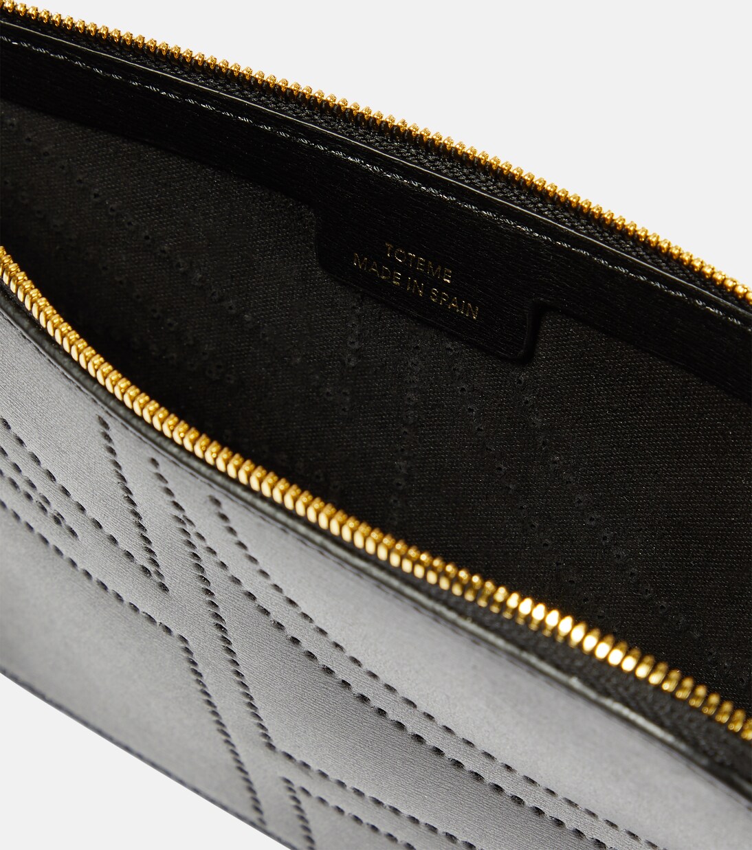 Pochette in pelle con monogramma | Toteme