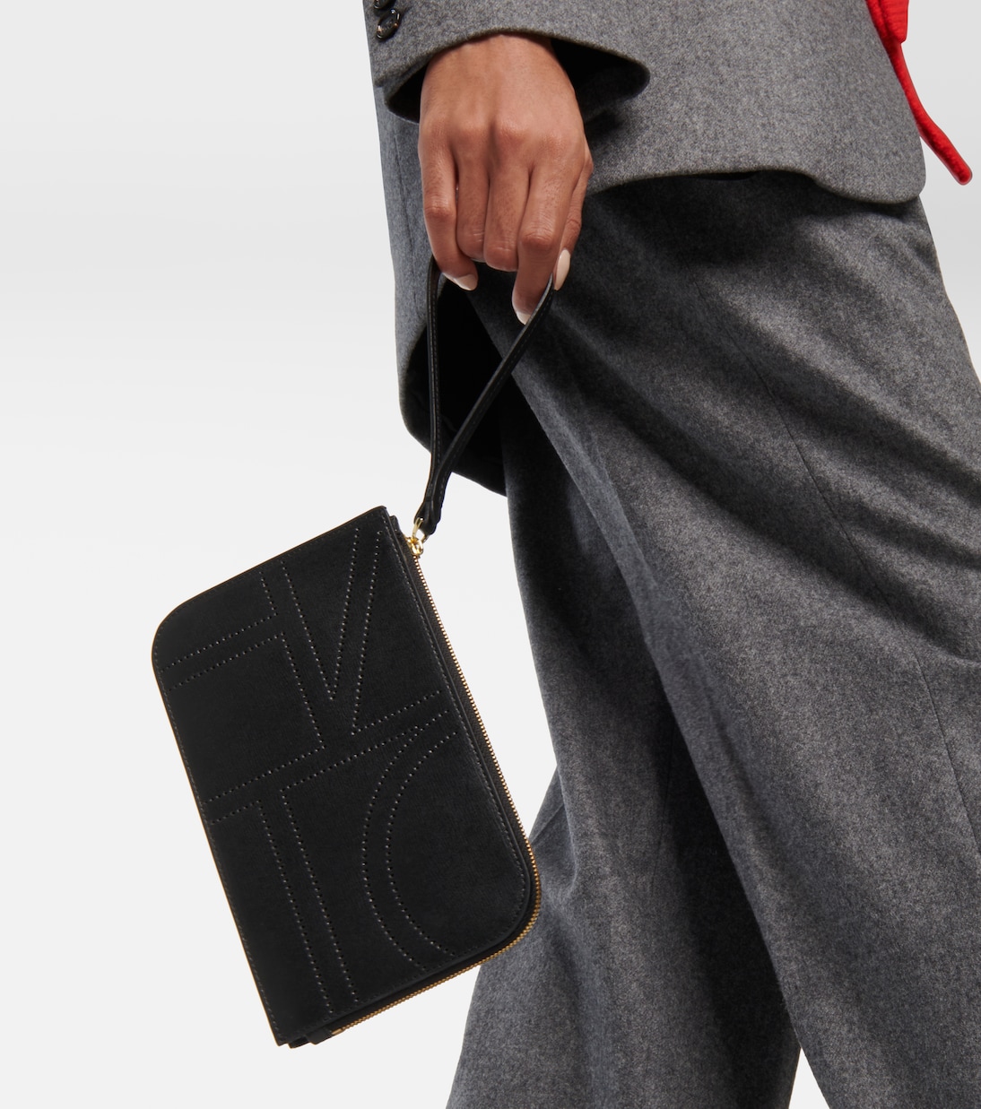 Pochette in pelle con monogramma | Toteme