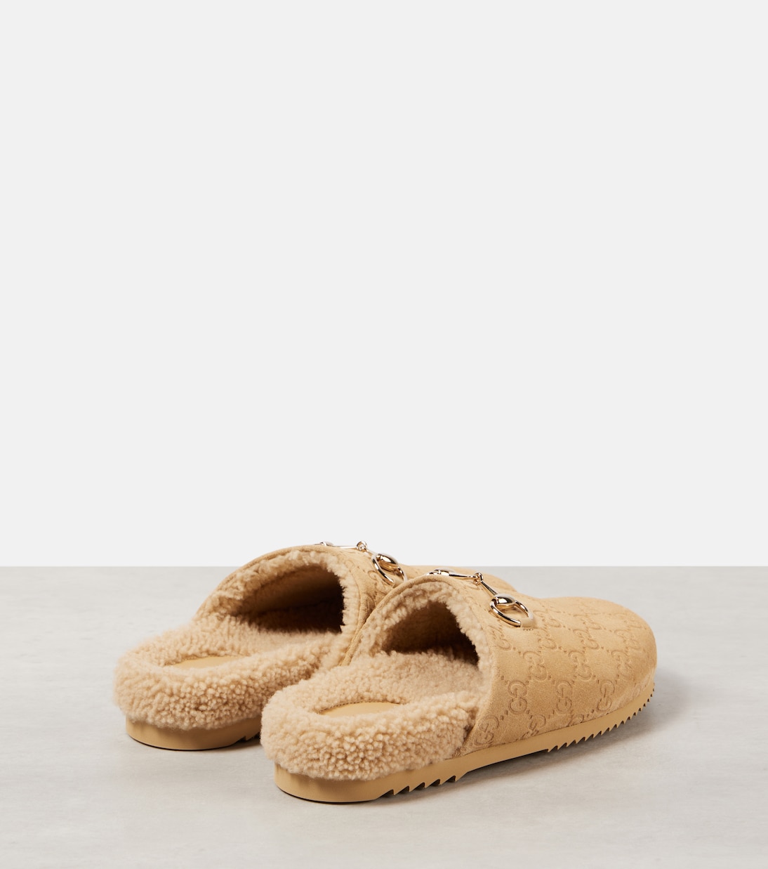 Mules Horsebit in suede GG | Gucci