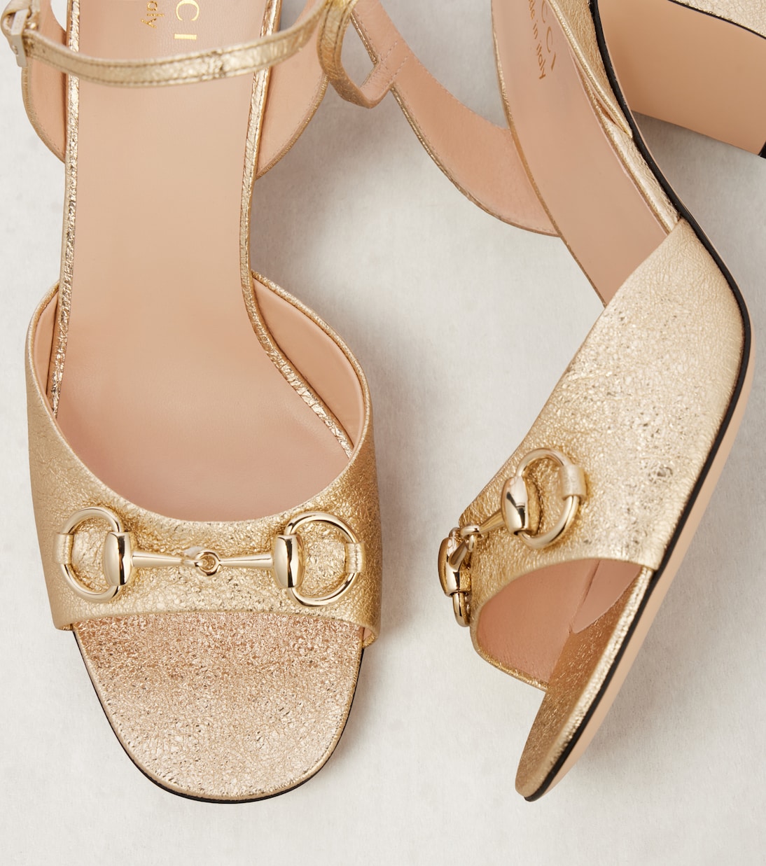 Horsebit metallic leather sandals in gold - Gucci | Mytheresa Horsebit metallic leather sandals in gold - Gucci | Mytheresa