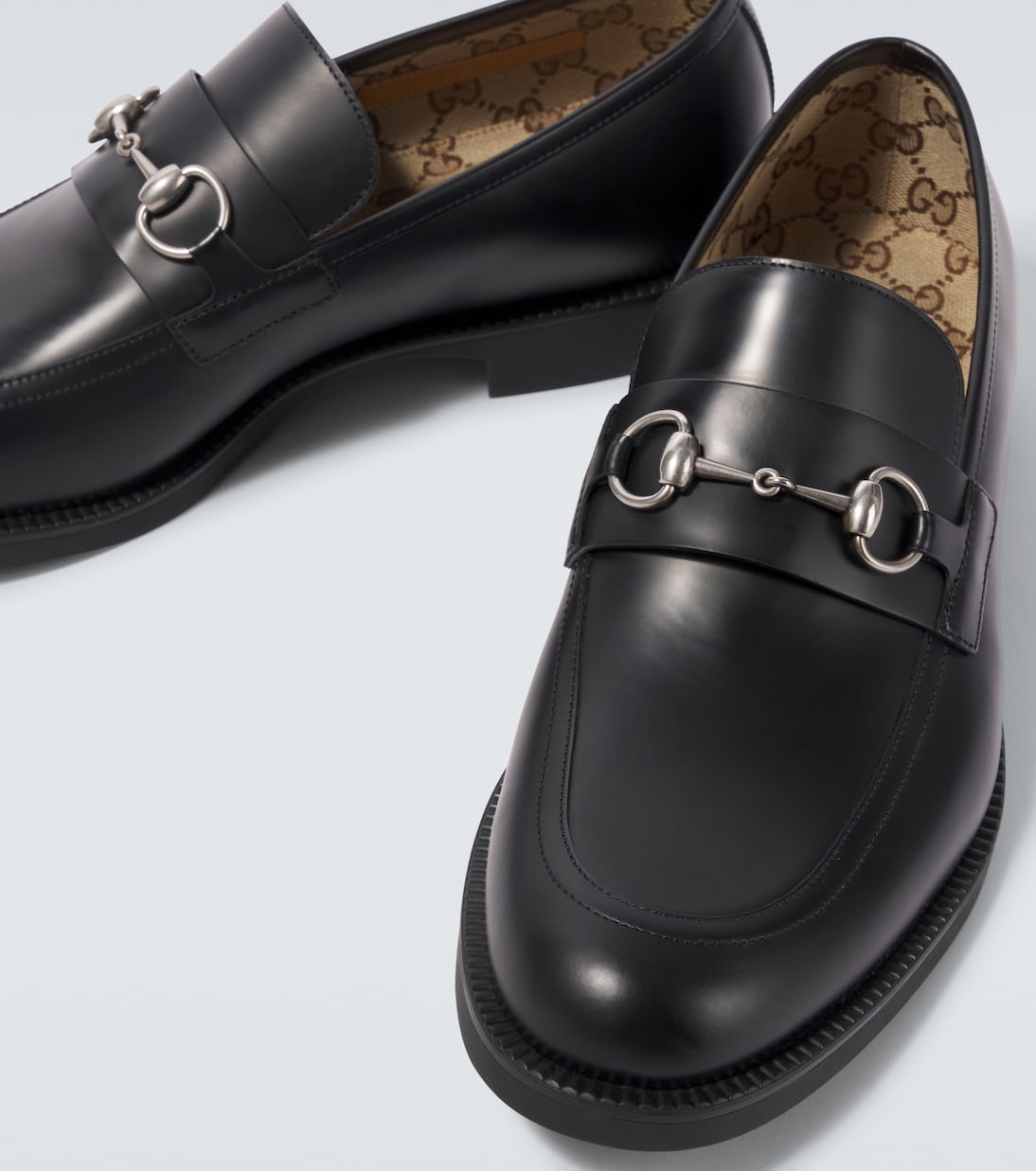 Horsebit leather loafers in black Gucci Mytheresa