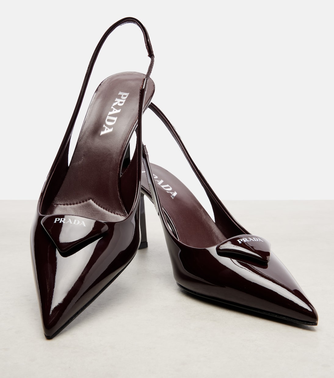 Patent leather slingback pumps | Prada