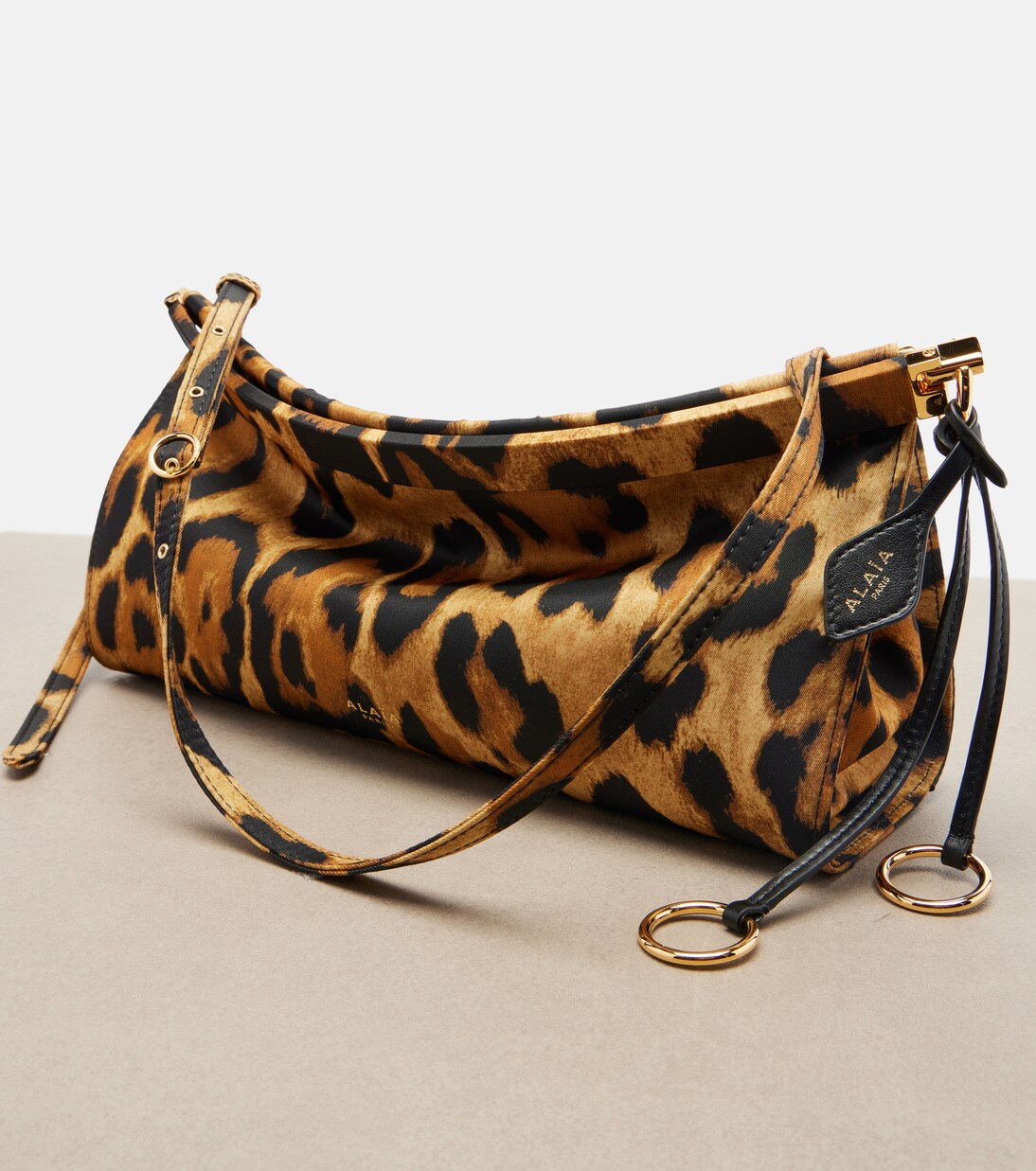 Le Click East West Medium printed shoulder bag | Alaïa