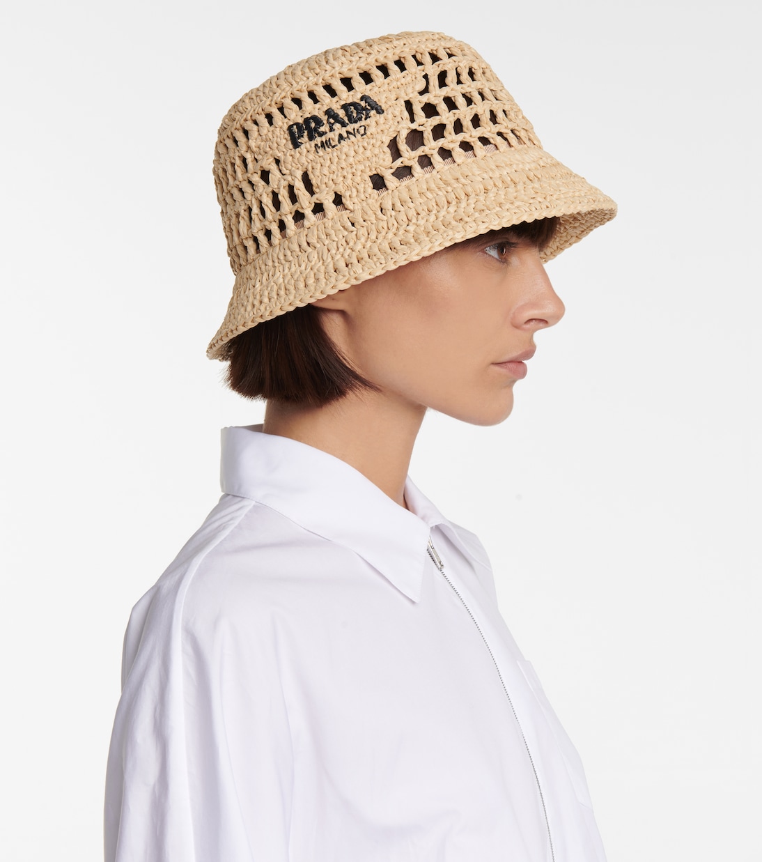 Cappello estivo PRADA in rafia, stile bucket per giovani trendy
