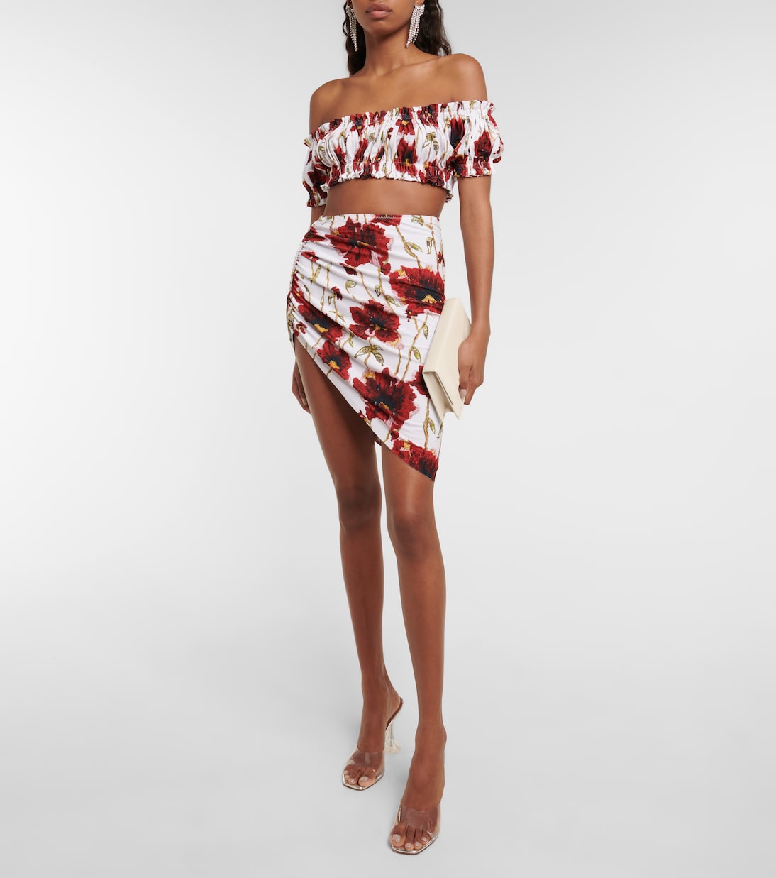 Mini-jupe asymétrique à fleurs | Norma Kamali