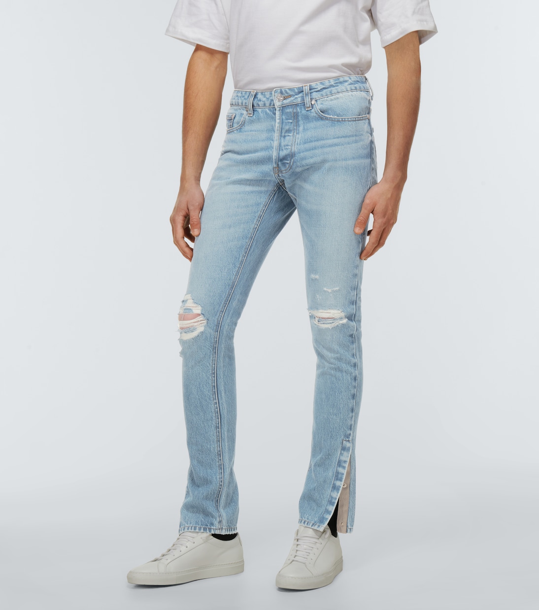 Jeans slim con rotos | Due Diligence