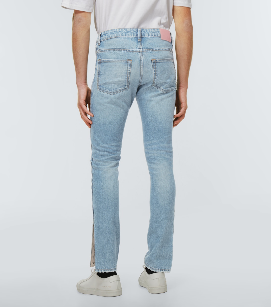Jeans slim con rotos | Due Diligence