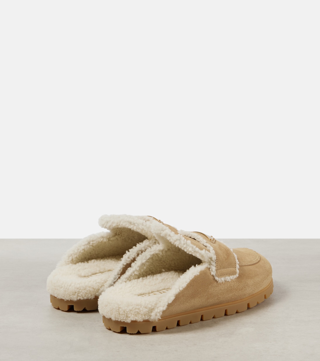 Shearling-lined suede mules | Prada