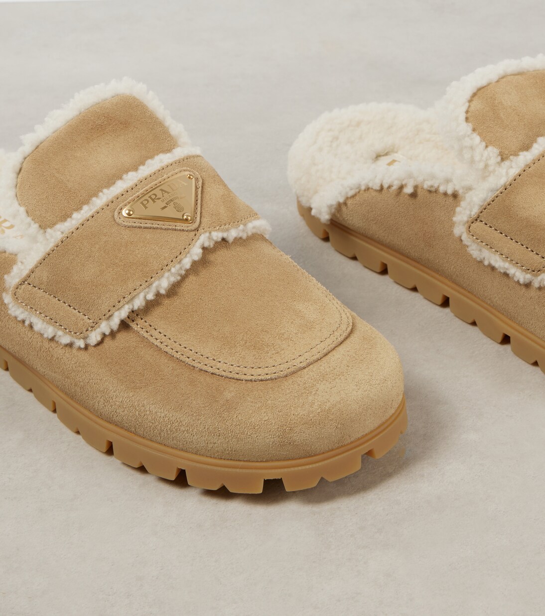 Shearling-lined suede mules | Prada