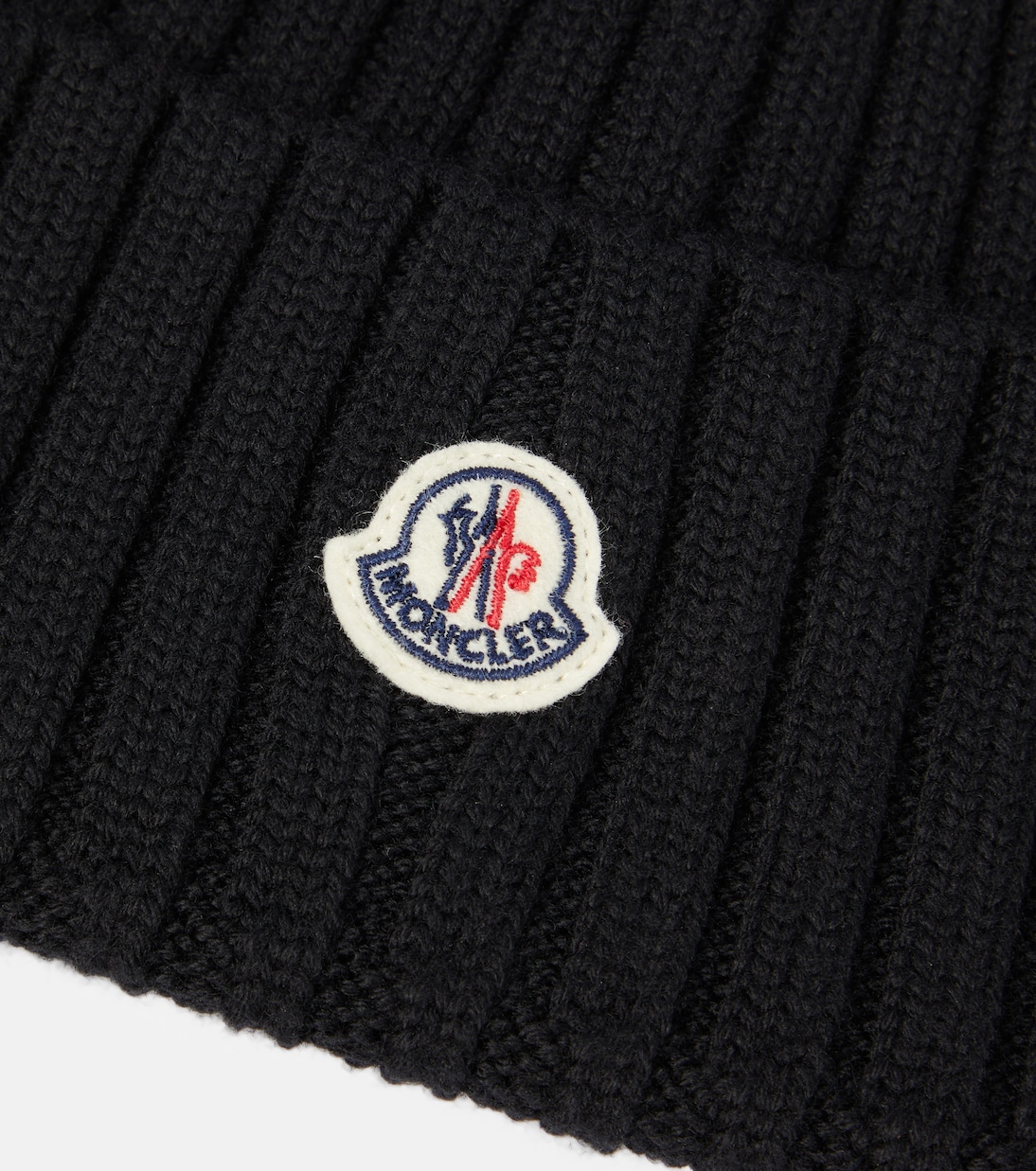 Cappello in pura lana vergine con logo MONCLER, stile giovane e moderno
