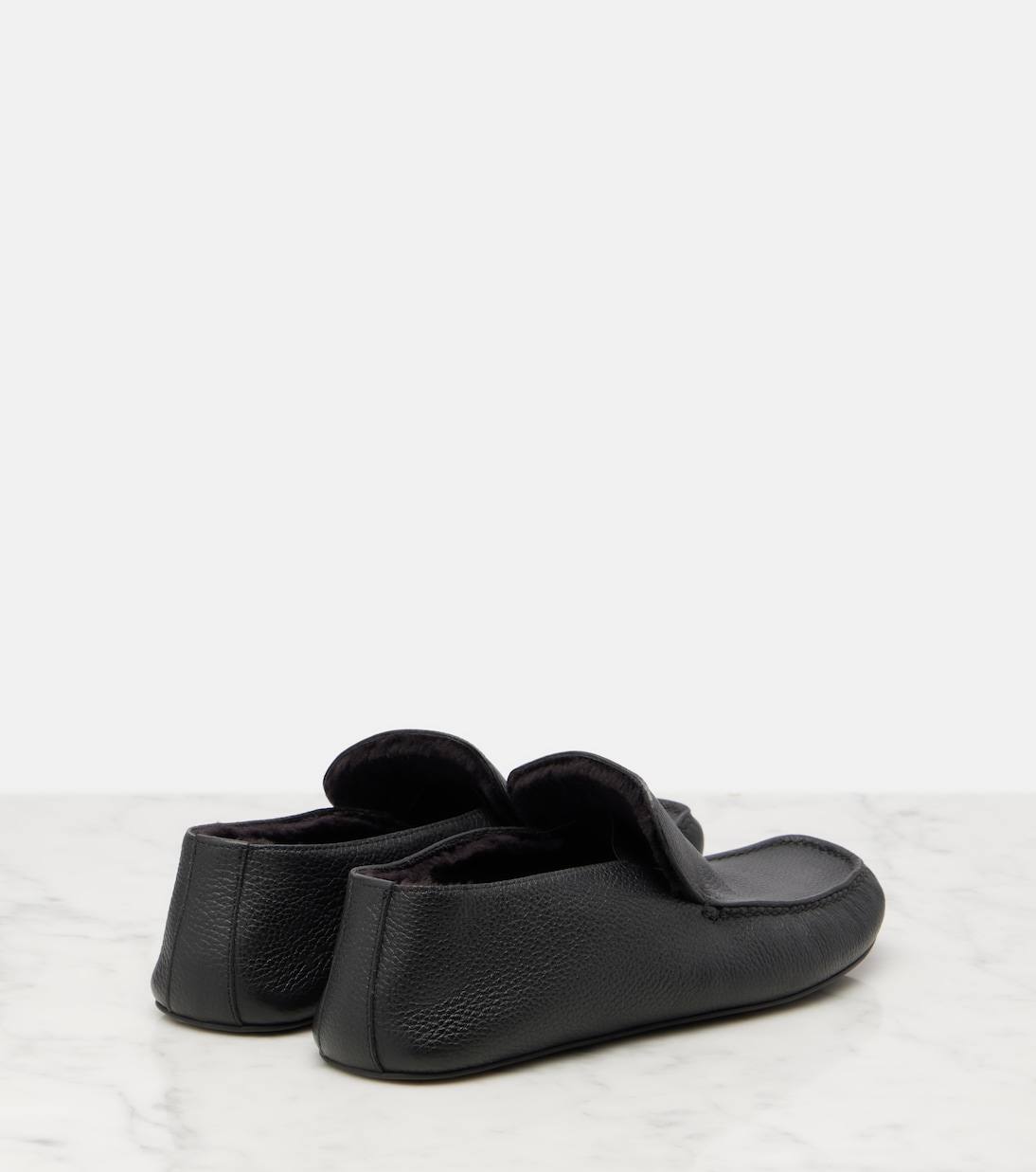 Leo shearling-lined leather loafers | The Row