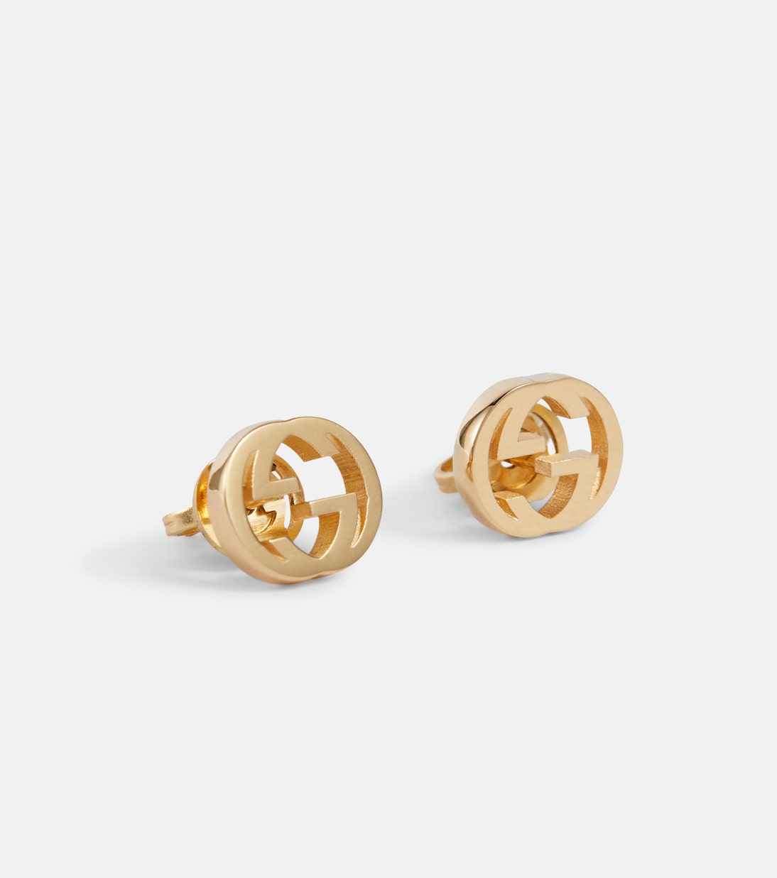 Orecchini in oro 18kt GUCCI con logo G intrecciato, stile giovane e moderno