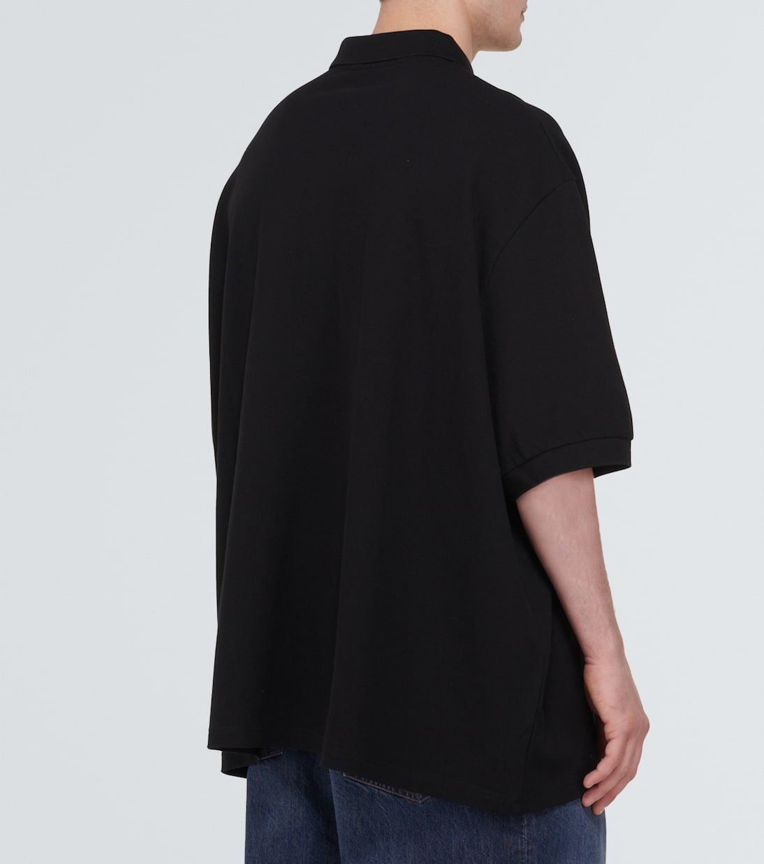 Oversized cotton pique polo shirt in black Balenciaga Mytheresa