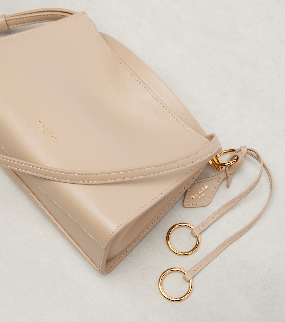 Le Click Small leather shoulder bag | Alaïa