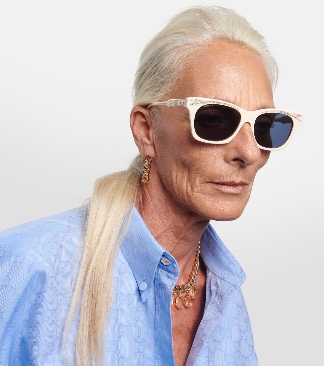 Occhiali da sole cat-eye con cristalli | Gucci