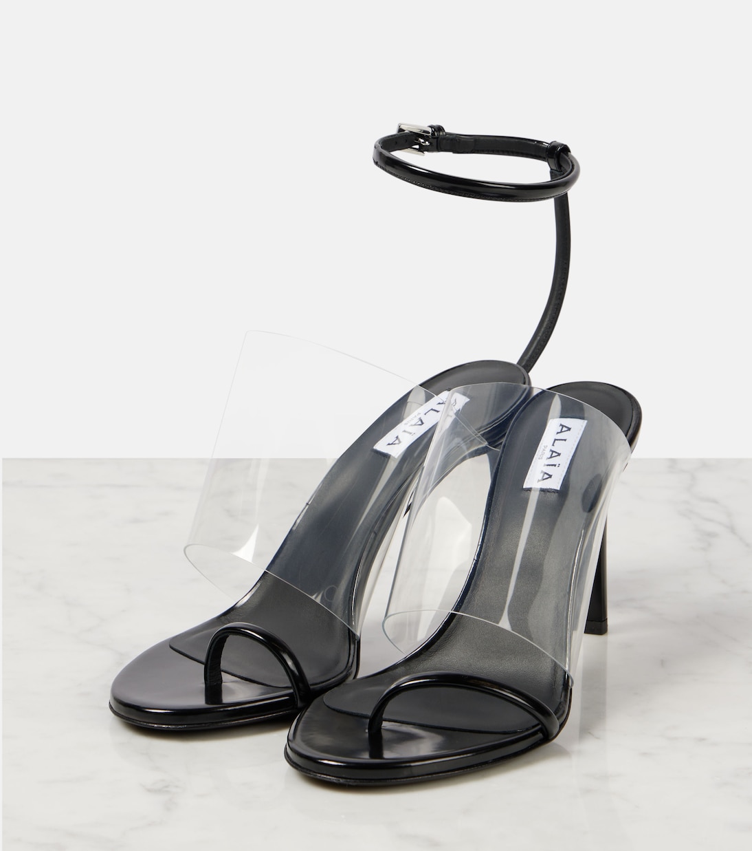 Sandali moderni ALAÏA in pelle e PU con dettagli Plexi 90 per un look giovane e alla moda