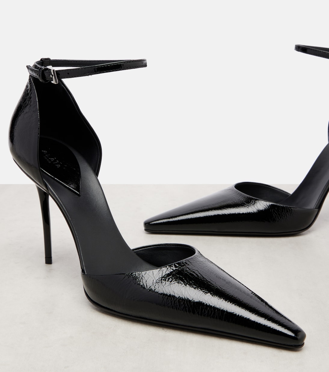 D'Orsay 110 patent leather pumps | Alaïa