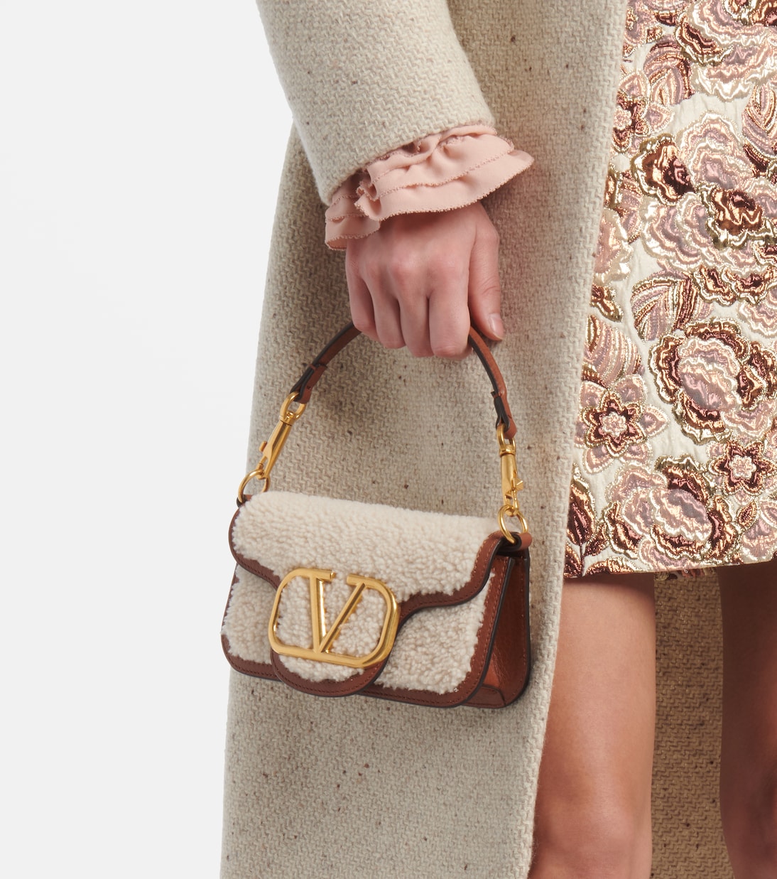 Locò Small shearling and leather shoulder bag | Valentino Garavani