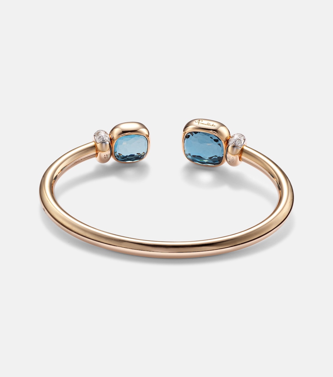 Bracciale in oro rosa 18kt Pomellato Nudo con topazio blu e diamanti, design giovane e chic.
