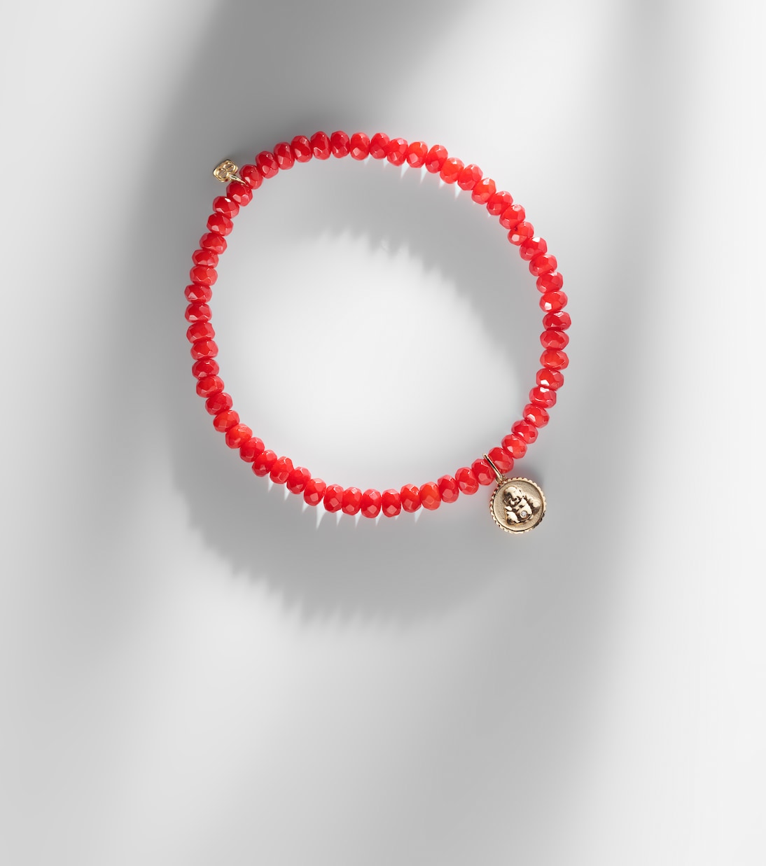 Bracciale in oro 14kt con perline, corallo e diamanti per giovani alla moda