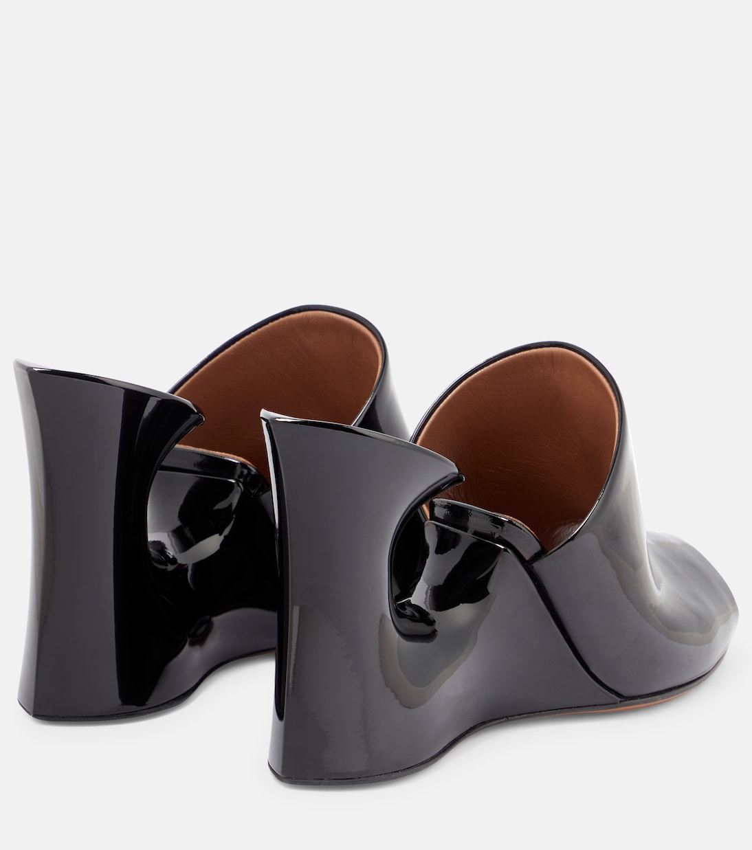 Mules Sculpture en cuir verni | Alaïa