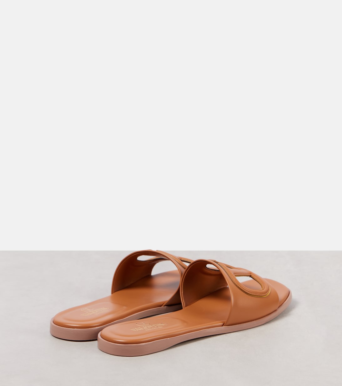 VLogo cutout leather slides | Valentino Garavani
