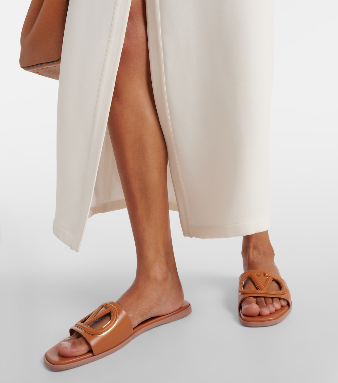 VLogo cutout leather slides | Valentino Garavani