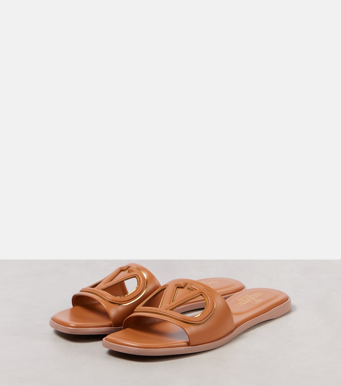 VLogo cutout leather slides | Valentino Garavani