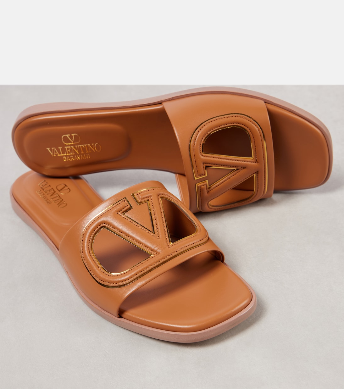 VLogo cutout leather slides | Valentino Garavani